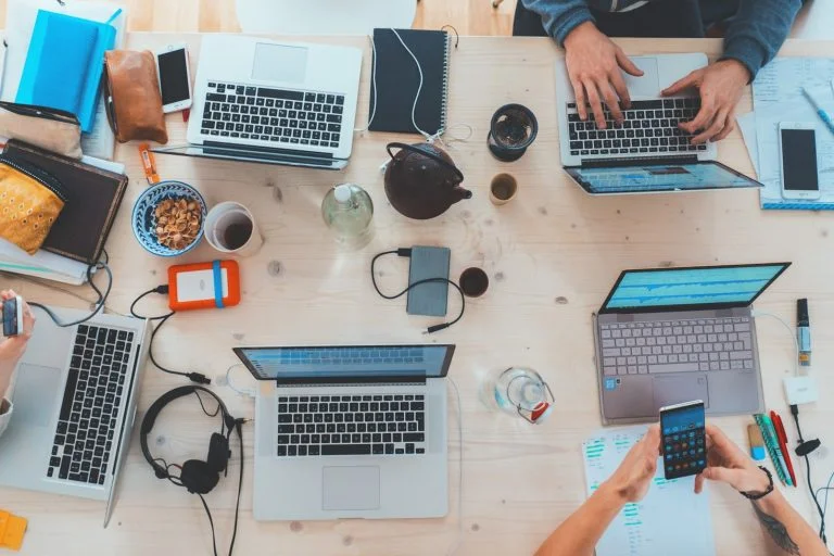 Group of people working with their laptops